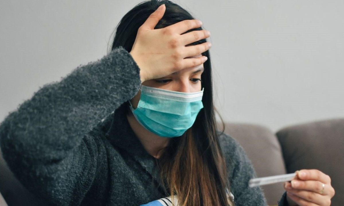 Young woman with COVID Test